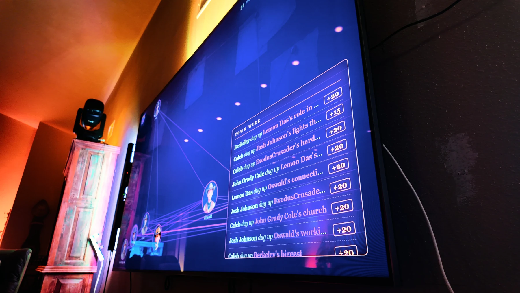 An immersive game screen surrounded by colored lighting.